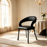 LIVARA Armchair - Premium Leather Upholstery with Sculptural Curved Backrest and Reinforced Metal Frame, Modern Accent Chair for Dining Room - Black