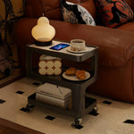 LIVARA Three‑Tier Sintered Stone Coffee Table with Lockable Steel Wheels, Matte Frame, Side Storage Black