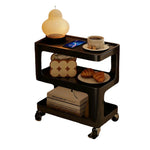LIVARA Three‑Tier Sintered Stone Coffee Table with Lockable Steel Wheels, Matte Frame, Side Storage Black