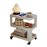 LIVARA Three‑Tier Sintered Stone Coffee Table with Lockable Steel Wheels, Matte Frame, Side Storage White