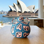 LIVARA Rune Ceramic Vase - Sculptural Double-Handle Design with Hand-Painted Symbol Pattern Handcrafted Artistic Decor for Modern Interiors - Blue Multicolor