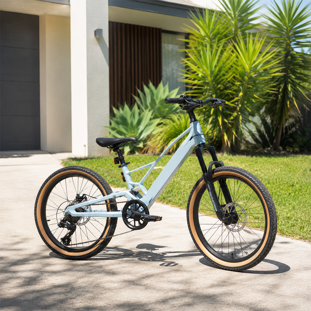 VOLTUS Youth Magnesium Alloy Mountain Bike with Front Suspension, Shimano Gears and Dual Disc Brakes - Blue