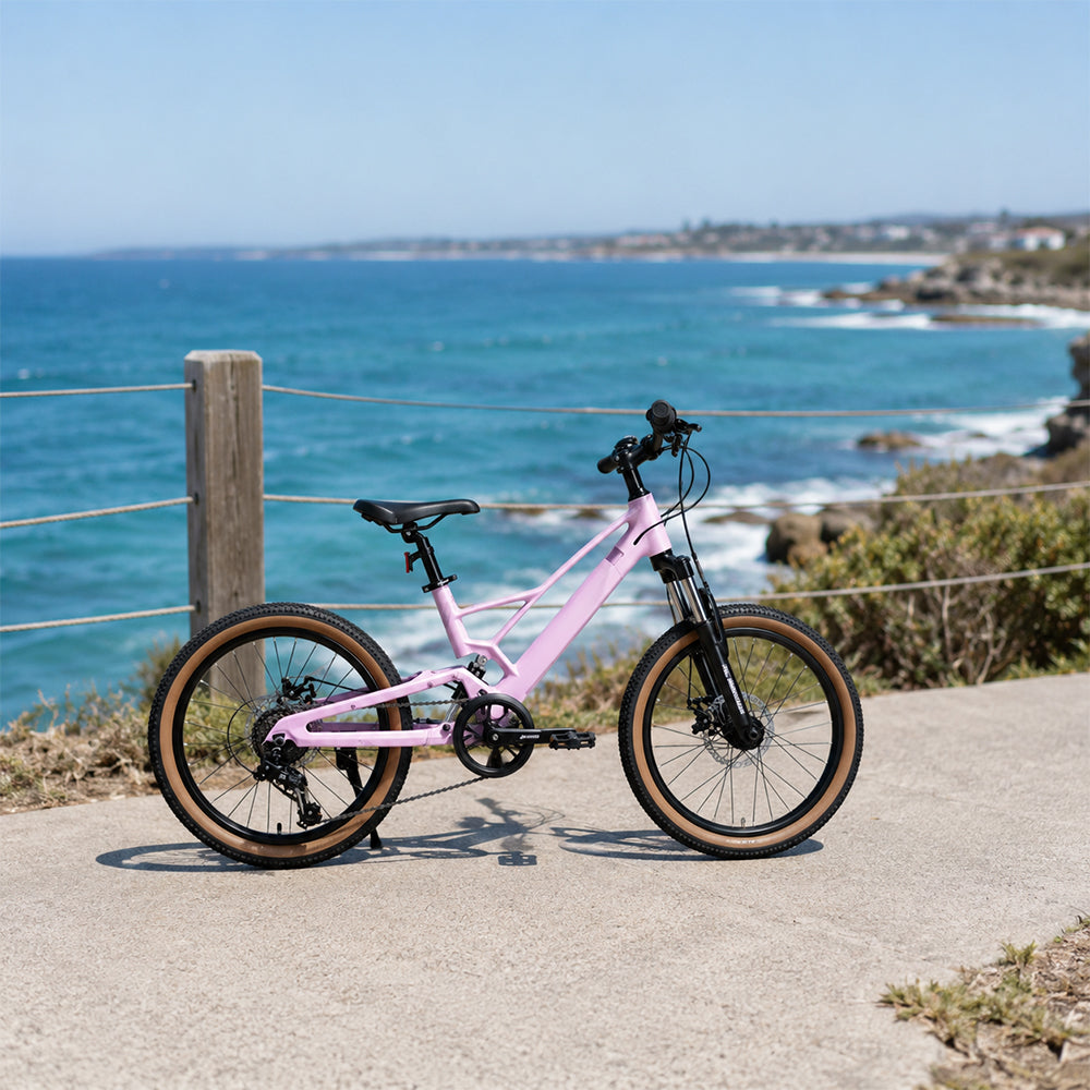 VOLTUS Youth Magnesium Alloy Mountain Bike with Front Suspension, Shimano Gears and Dual Disc Brakes - Pink