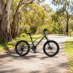 VOLTUS Youth Mountain Bike with Front Suspension, Multi-Speed Gears and Dual Disc Brakes - Army Green