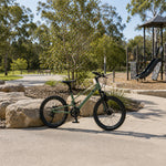 VOLTUS Youth Mountain Bike with Front Suspension, Multi-Speed Gears and Dual Disc Brakes - Army Green