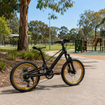 VOLTUS Youth Mountain Bike with Front Suspension, Multi-Speed Gears and Dual Disc Brakes - Black