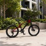 VOLTUS Youth Mountain Bike with Front Suspension, Dual Disc Brakes and Wide All-Terrain Tyres - Red & Black