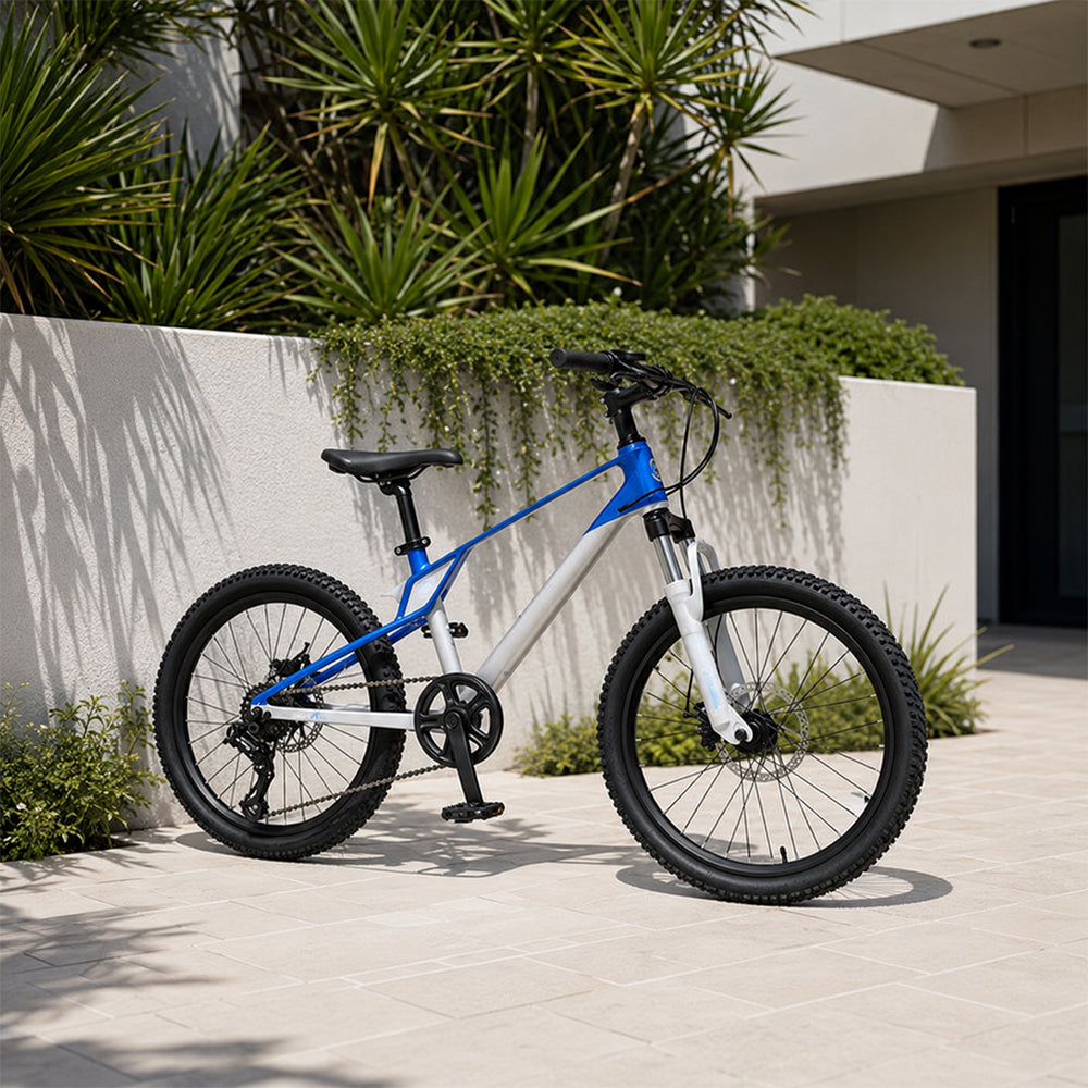 VOLTUS Youth Mountain Bike with Front Suspension, Dual Disc Brakes and Wide All-Terrain Tyres - Silver & Blue