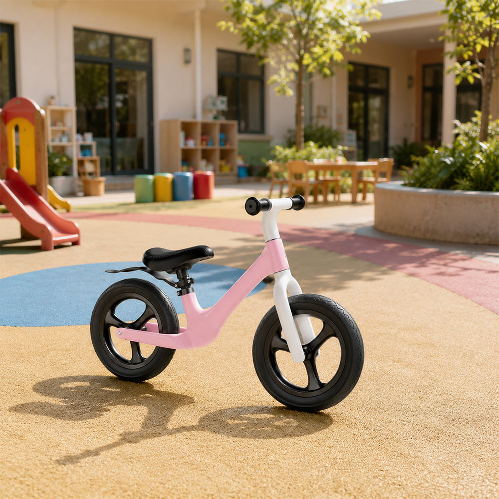 VOLTUS 12 Inch Kids Balance Bike with Nylon Frame, Lightweight Design and Adjustable Saddle for Early Riding Training - Pink