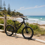 VOLTUS 24 Inch Youth Mountain Bike with 7-Speed Gear System, Disc Brake and Suspension Fork for Outdoor Riding - Black