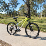 VOLTUS 24 Inch Youth Mountain Bike with 7-Speed Gears, Disc Brakes, Suspension Fork and Aluminium Frame - Green Silver